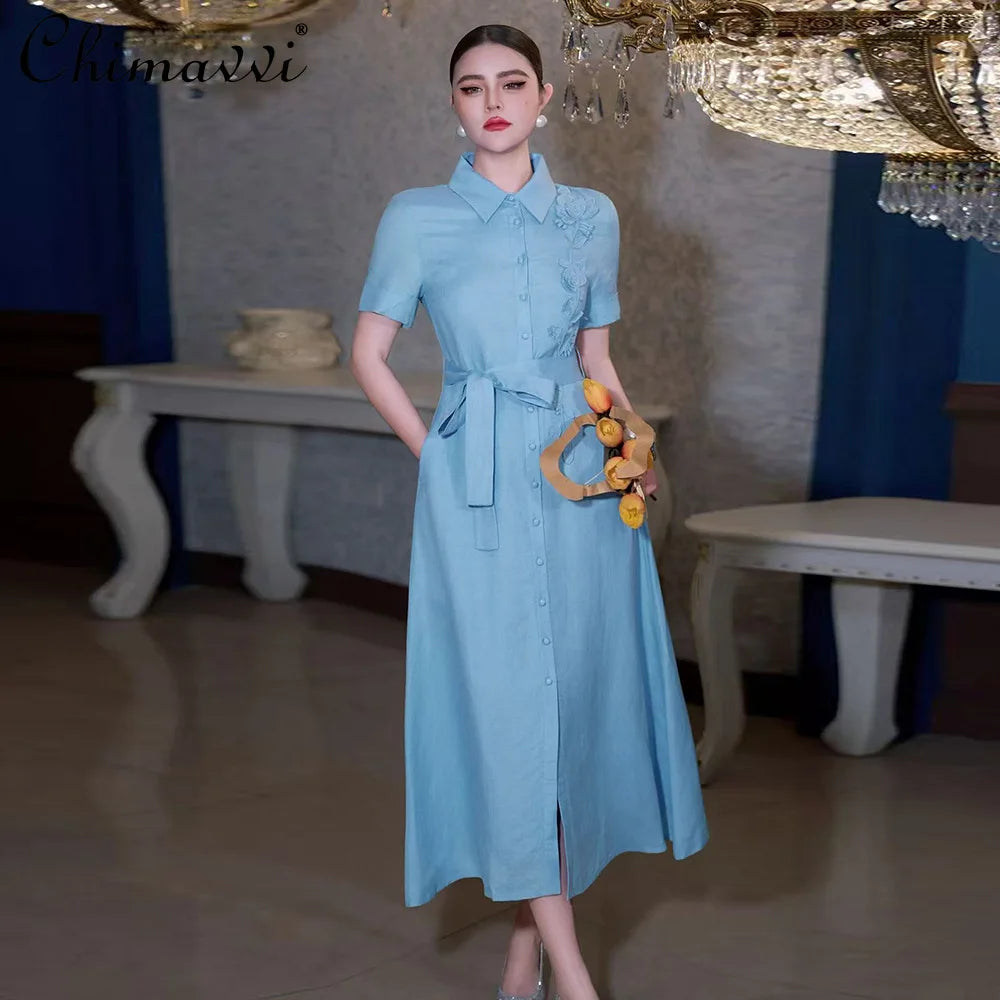 Robe longue pour femme au style élégant français, col polo, manches courtes, fleurs 3D, simple-boutonnage, taille haute avec nœud et lacets (Collection Printemps 2026)