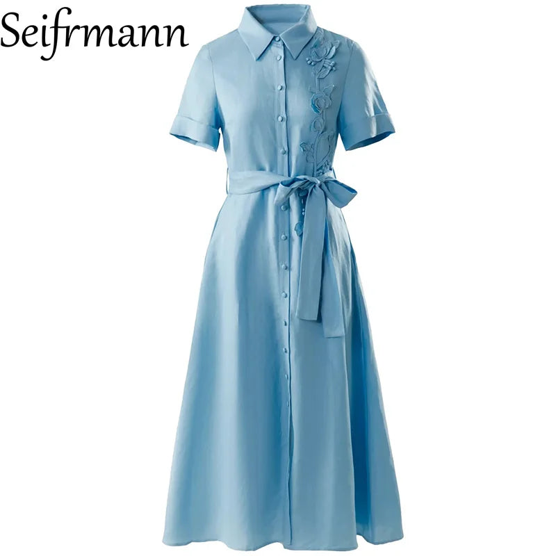 Nouvelle robe longue femme tendance été 2026 Seifrmann à revers, manches courtes, simple boutonnage, avec ceinture et taille cintrée